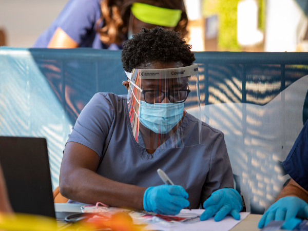 COVID-19 testing center worker