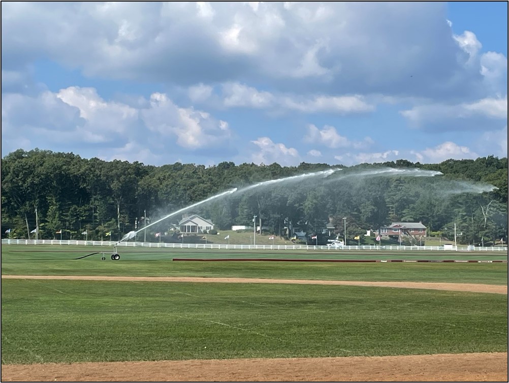 Irrigation of a turf field with a water cannon