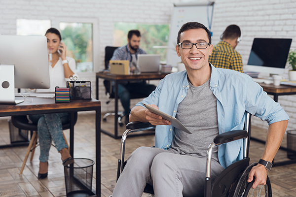 Man in wheelchair at work